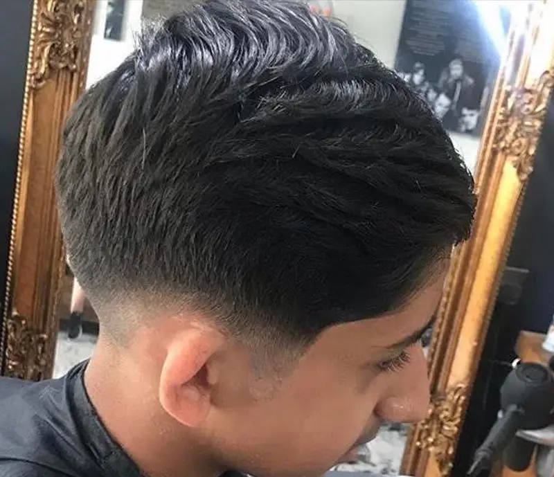 Client haircut photographed inside Moustache Barbers